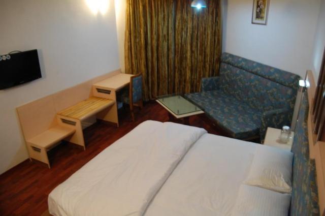 Pleasant Stay Kodai Hotel Pvt. Ltd. Kodaikanal Rum bild